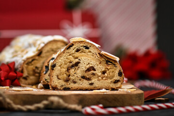 Sticker - Slice of German Stollen cake, a fruit bread with nuts, spices, and dried fruits with powdered sugar traditionally served during Christmas time 