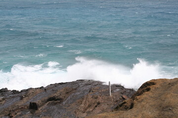 waves crashing on rocks