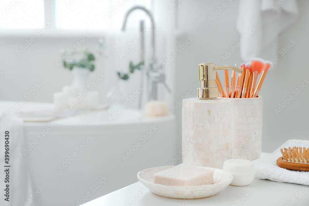 Set of bath accessories on table
