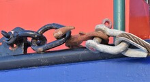 Weathered Chain With Hooks, Links And Clevis On A Ship. Shows Strength In Diversity.