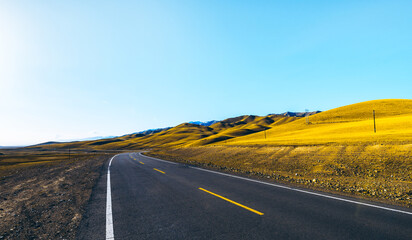 Wall Mural - Driving on the road in Xinjiang Scenic Area