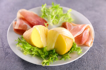 raclette cheese,  ham and potato