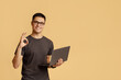 © Prostock-studio - Excellent result, good feedback and vin. Smiling male in glasses expresses emotions of success