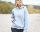 Fototapeta  - Woman wear hoodie on the beach
