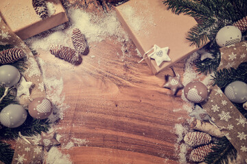 Christmas wooden background with snow fir tree. View with copy space