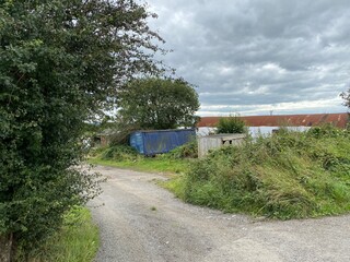 Wall Mural - Discarded shipping containers, and old outbuildings on, Healey Croft Lane, East Ardsley, Wakefield, UK