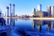 © Sergey + Marina - Skyscrapers Moscow City International Business Center from the side of the Moskva River with a reflection on fresh ice. December 12, 2020