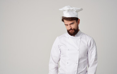 a chef in a light suit gesturing with his hands a professional in his field cooking model