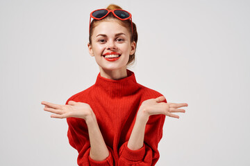 woman in sunglasses on a light background model portrait closeup