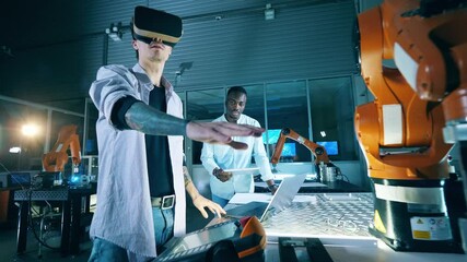 Wall Mural - two engineers are virtually navigating an automated device