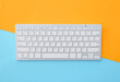 © Pixel-Shot - Computer keyboard on color background