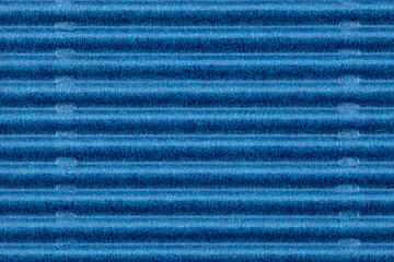 Wall Mural - Background made of blue corrugated cardboard with horizontal stripes, view from above.