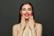 © artmim - Healthy model woman showing red manicured nails