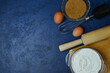 baking ingredients, eggs, flour and brown cane sugar, quarantine home baking concept, food background