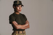 © Drobot Dean - Confident african american soldier woman posing with arms crossed
