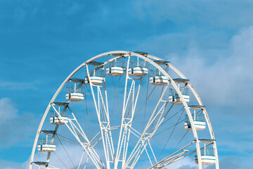 Wall Mural - ferris wheel on blue sky background