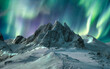 Aurora borealis over majestic mountain in snowy on Segla Island