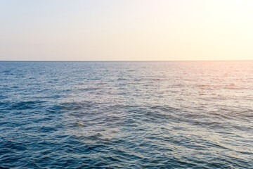 Wall Mural - Panoramic sunset view over the sea. Nothing but sky and water. space for text