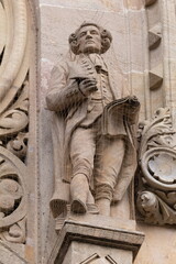 On the streets in Spain in public places.
Plaster or marble sculptures and statues, decoration of urban architecture.