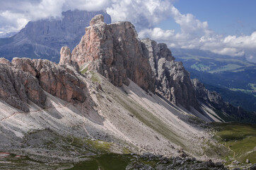 Chedul valley with Pizes da Cier mountain range on the left and Mont de Seura mountain on the right, as seen from Crespeina pass, Puez-Odle Nature park, Dolomites, South Tirol, Italy.