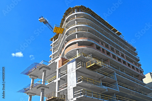 Obraz na plátně Crane and highrise construction site