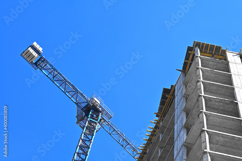 Fotografie, Obraz Crane and highrise construction site