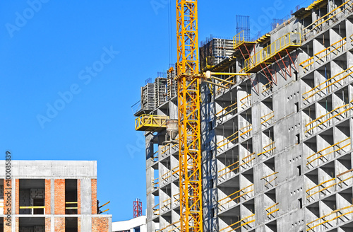 Obraz na plátně Crane and highrise construction site