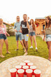© Impact Photography - Friends having fun playing beer pong