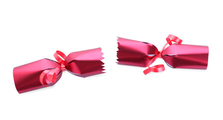 Wall Mural - Open red Christmas cracker isolated on white, top view