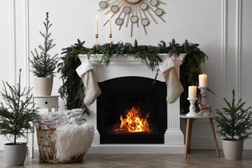 Wall Mural - Stylish room interior with fireplace and beautiful Christmas decor