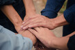 © Suriyo - Group people hand in hand concept partner teamwork community