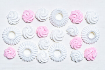 Wall Mural - cake white pink marshmallow meringue cookies background set