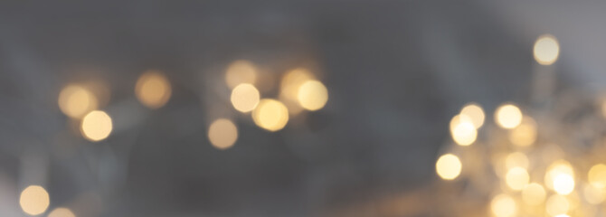 Aufkleber - Blurred abstract bokeh background with golden light effects and sparks for festive glamorous celebration concepts.