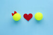 Smiling tennis balls girl with red bow and boy and hearts. Valentine’s Day tennis flatly celebration card, poster. Love and tennis concept .flatly