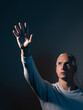 © Ulia Koltyrina - Bald man with electrodes in his brain , futuristic concept,