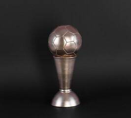 Wall Mural - golden soccer ball on golden pedestal