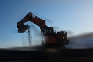 Wall Mural - blurred view of big excavator at worksite of coal mine