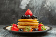 © Kamran - front view delicious pancakes with fruits and berries on dark background fruit cake dessert