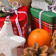 sweet food top view background for merry christmas or new year holiday decoration - chocolate candies, tangerines, cookies on white wood