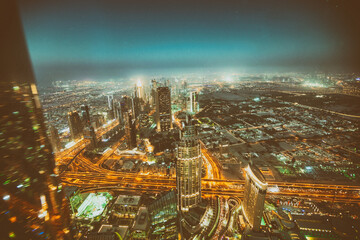 DUBAI, UAE - DECEMBER 4, 2016: Aerial night view of Downtown Dubai from top of the tower