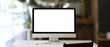 © Prathankarnpap - Front view of a computer with blank on white table at contemporary office.