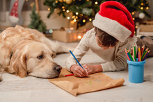 Little Boy Writing Letter To Santa