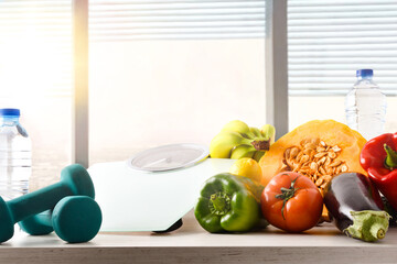 Wall Mural - Healthy life concept with vegetables fruits dumbbells and water