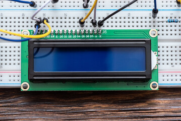 Wall Mural - liquid crystal display with copy space on the breadboard close up.