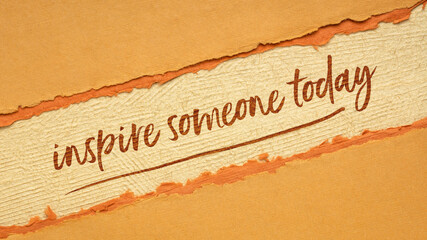 Wall Mural - Inspire someone today advice or  reminder - handwriting on a handmade paper, positive influence concept