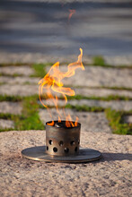 Eternal Flame At President John F. Kennedy's Grave Site At Arlington National Cemetery In Northern Virginia
