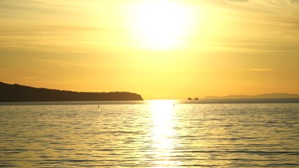 Canvas Print - Sea landscape with silhouettes of the Islands and the people on the SAP boards.