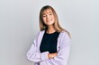 © Krakenimages.com - Teenager caucasian girl wearing casual clothes happy face smiling with crossed arms looking at the camera. positive person.