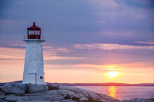 Peggy's Cove Lighthouse At Sunset