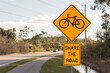 share the road with bikes (North American road sign)